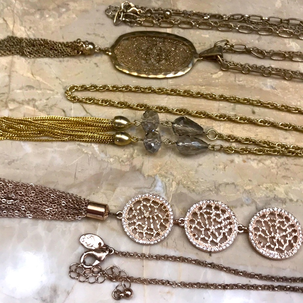 3 long tassel necklaces.